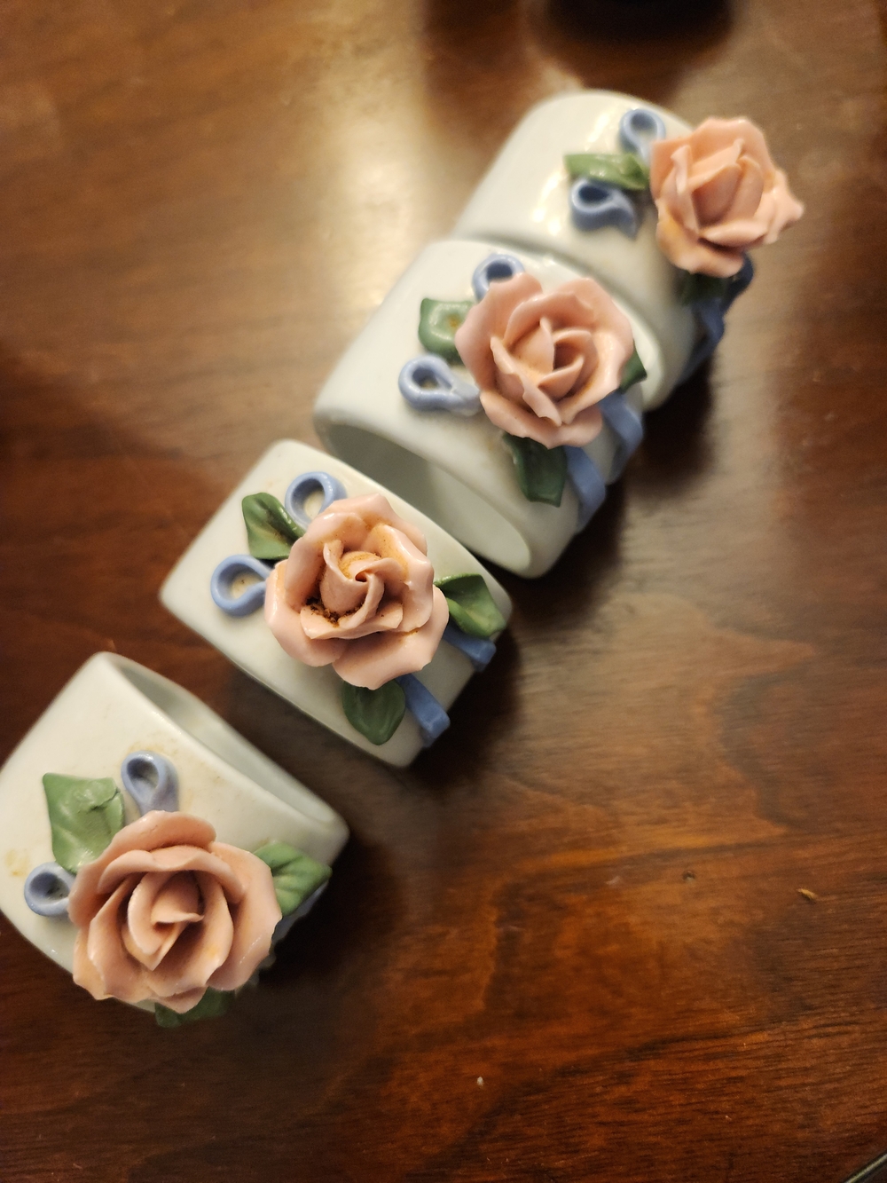 Source Unknown Porcelain Napkin Rings with Pink Roses and Blue Accents